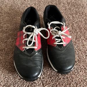 Nike Women’s Golf Shoes, black with removable plaid insert.